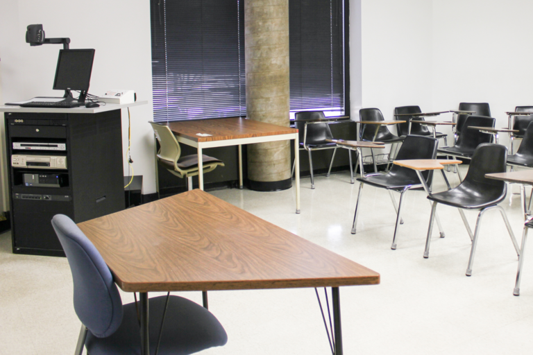 image of old instructor table and chair